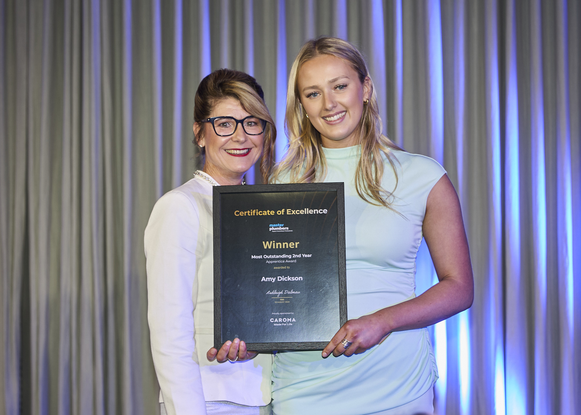 Amy Dickson receiving the Most Outstanding 2nd Year Apprentice Award at the 2026 Master Plumbers Excellence Awards
