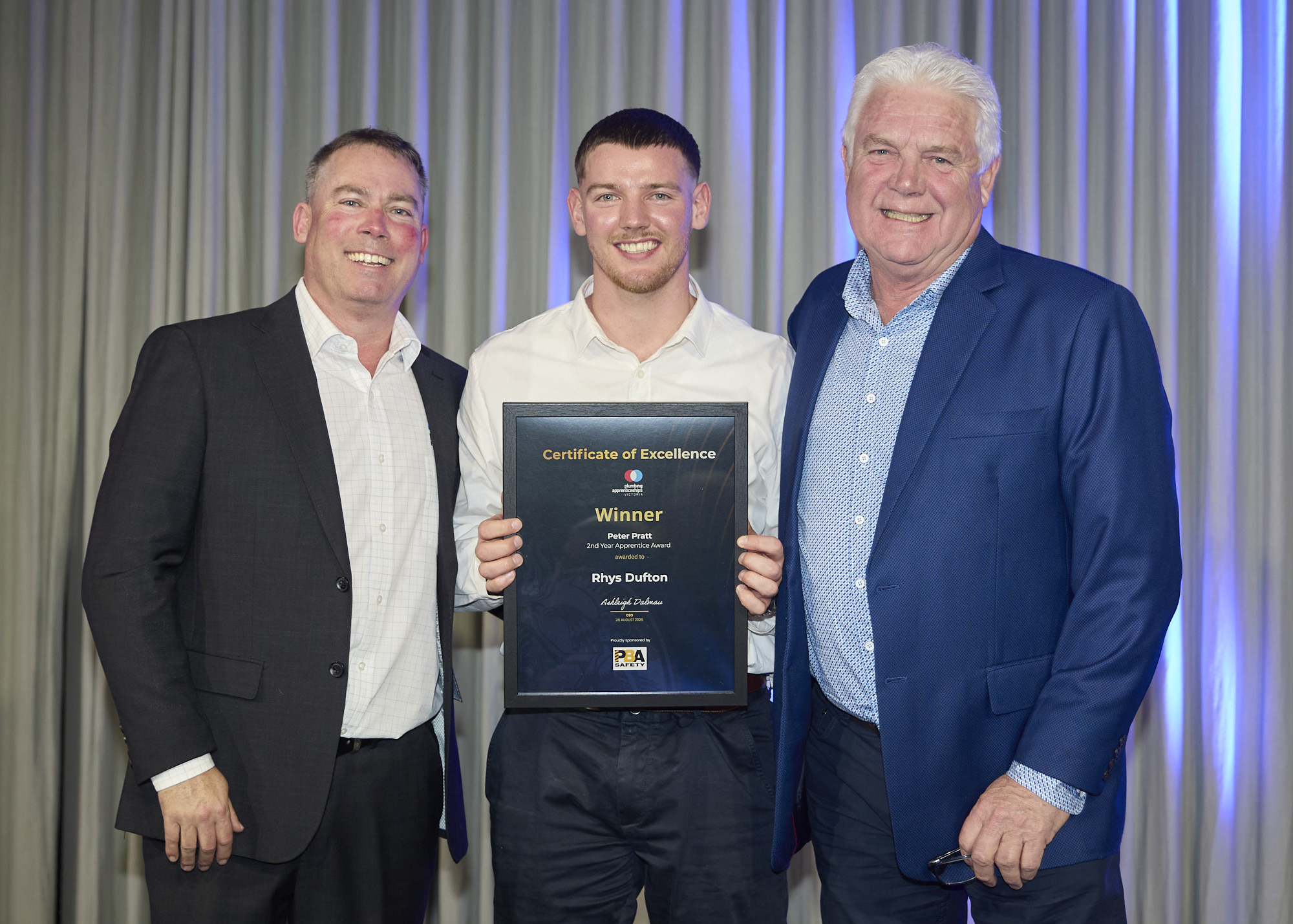 Rhys Dufton receiving the Peter Pratt 2nd Year Apprentice Award at the 2026 Master Plumbers Excellence Awards