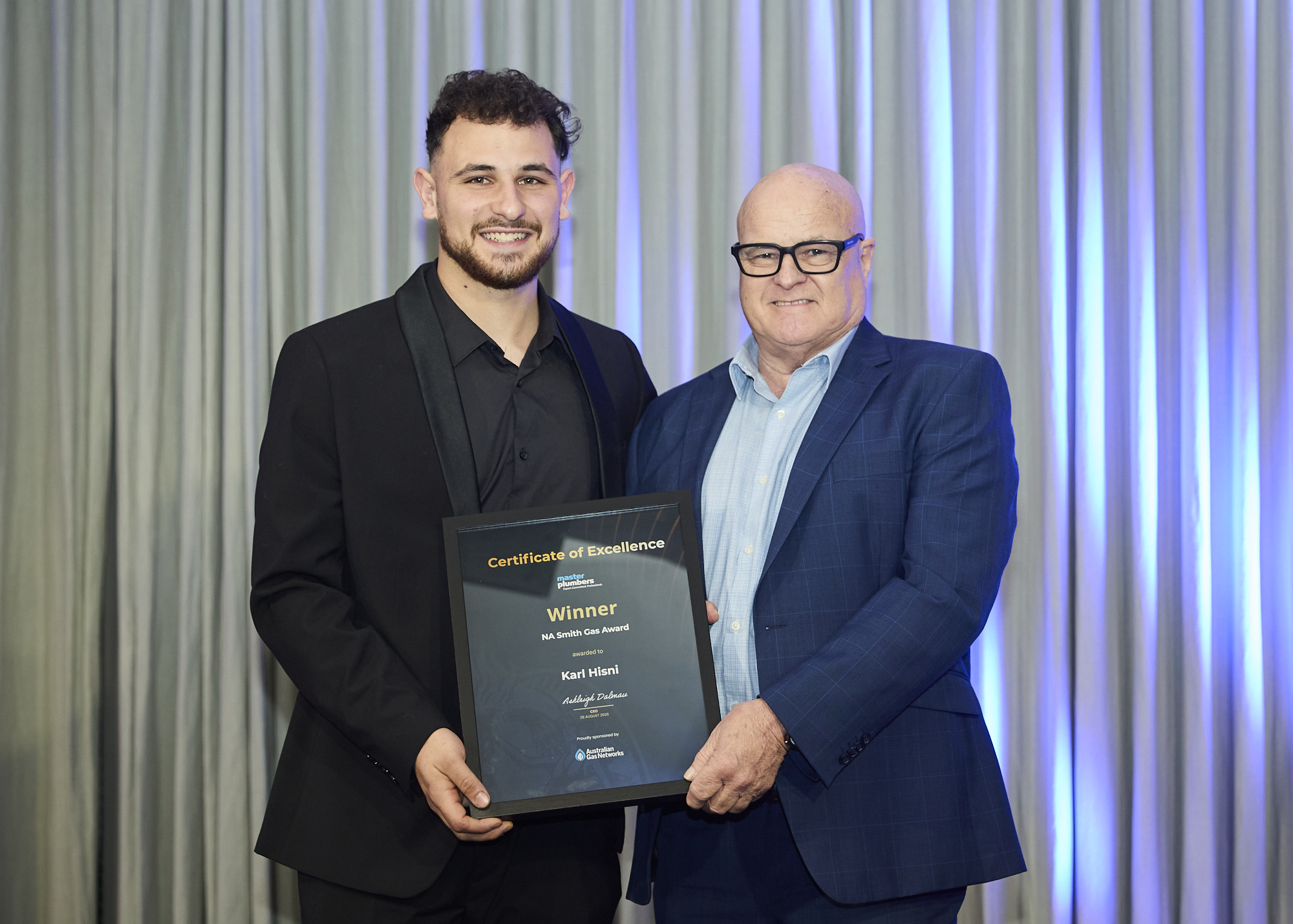 Karl Hisni receiving the NA Smith Gas Award at the 2026 Master Plumbers Excellence Awards