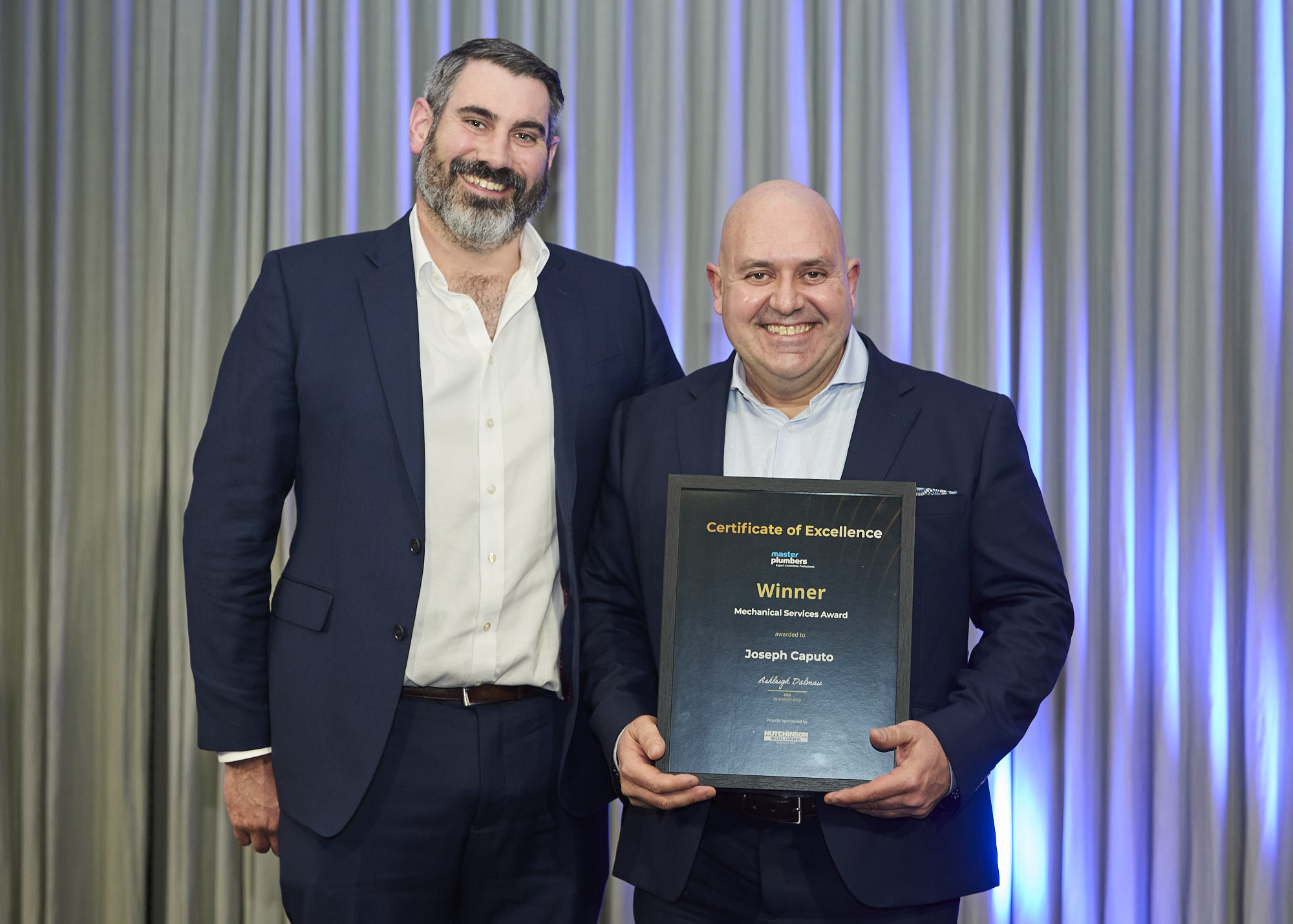Joseph Caputo receiving the Mechanical Services Award at the 2026 Master Plumbers Excellence Awards