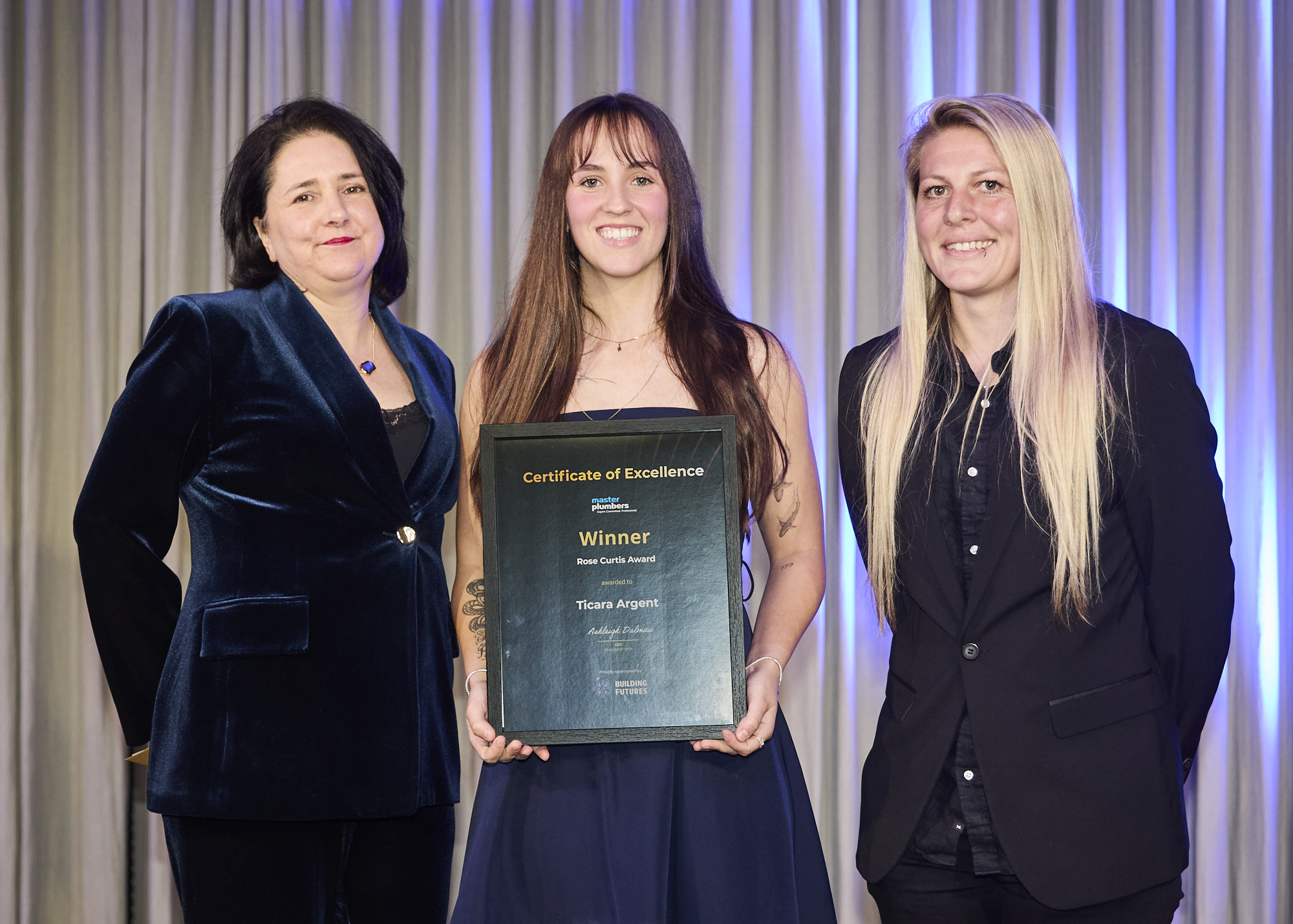 Ticara Argent receiving the Rose Curtis Award at the 2026 Master Plumbers Excellence Awards