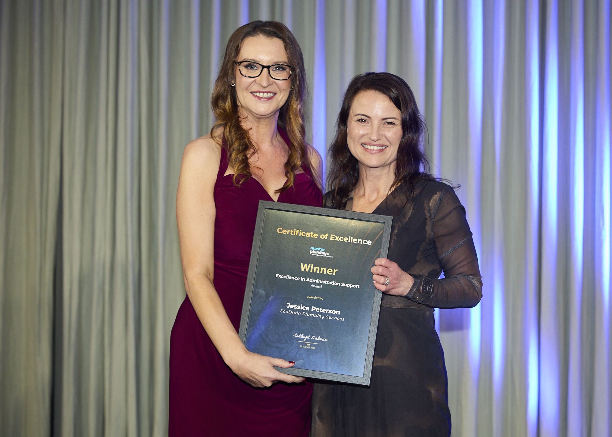 Jessica Peterson receiving the Excellence in Administration Support Award at the 2026 Master Plumbers Excellence Awards